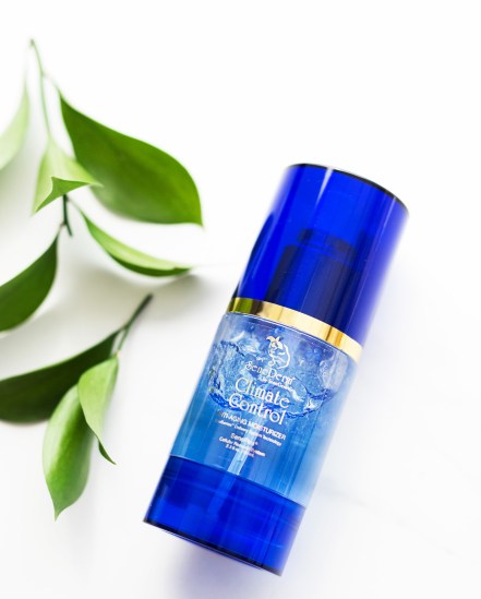 Senegence climate control skincare bottle and plant